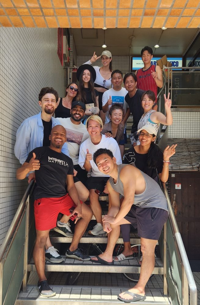 Crew on the stairs after a meetup